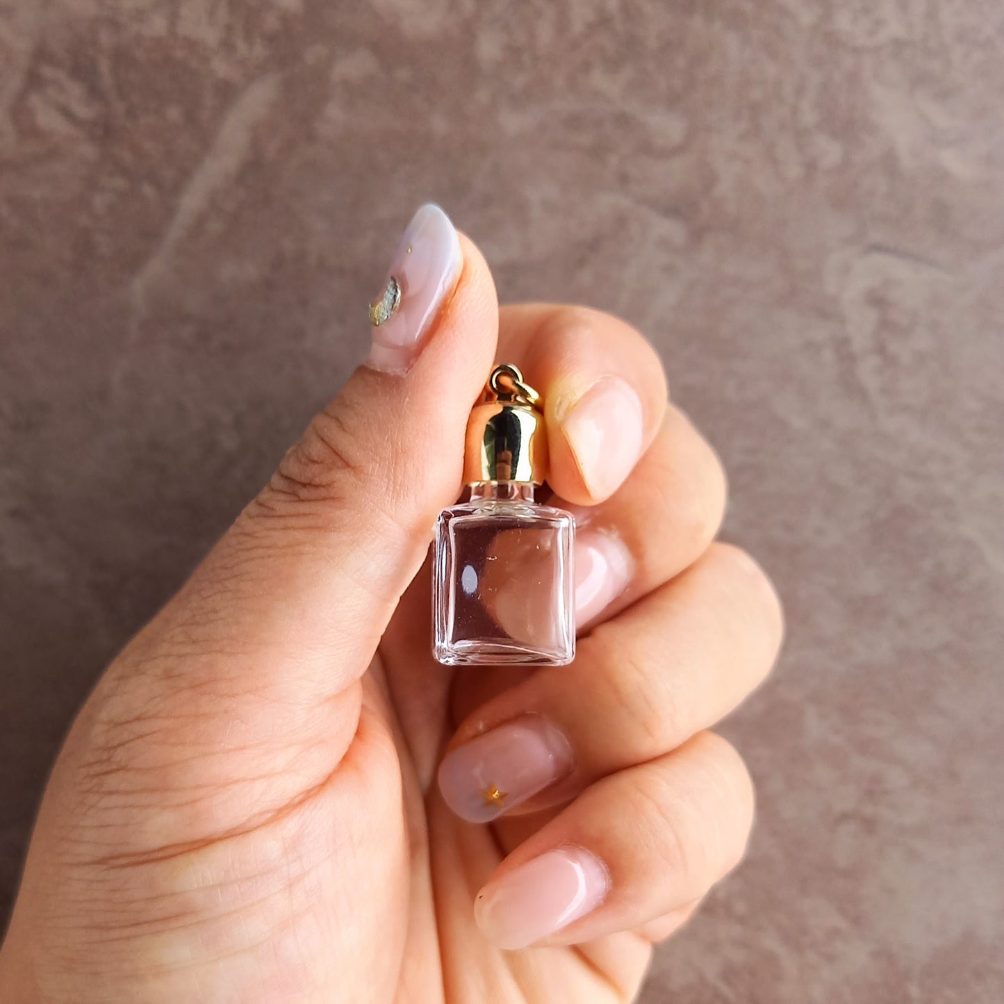 香水瓶ネックレス スクエアピンクボトル Pleiades【ストームグラス】