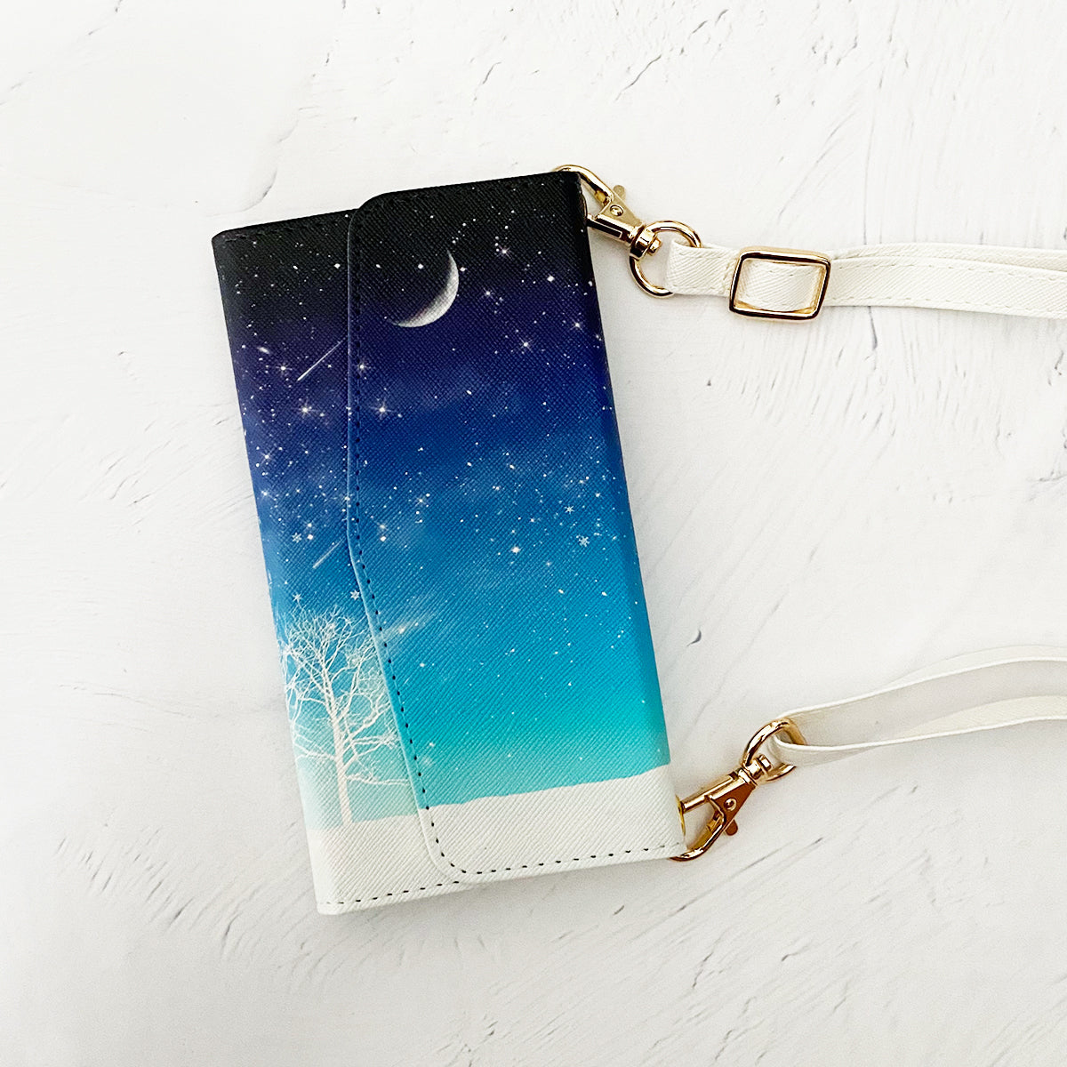 【三つ折り手帳型スマホケース/ショルダーストラップ付き】冬の星空(iPhone)