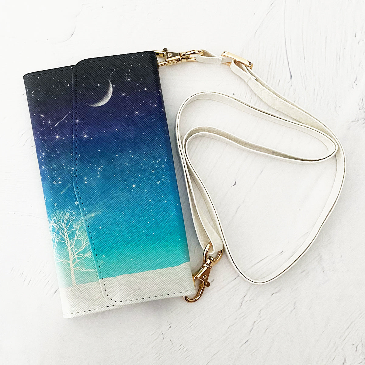 【三つ折り手帳型スマホケース/ショルダーストラップ付き】冬の星空(iPhone)