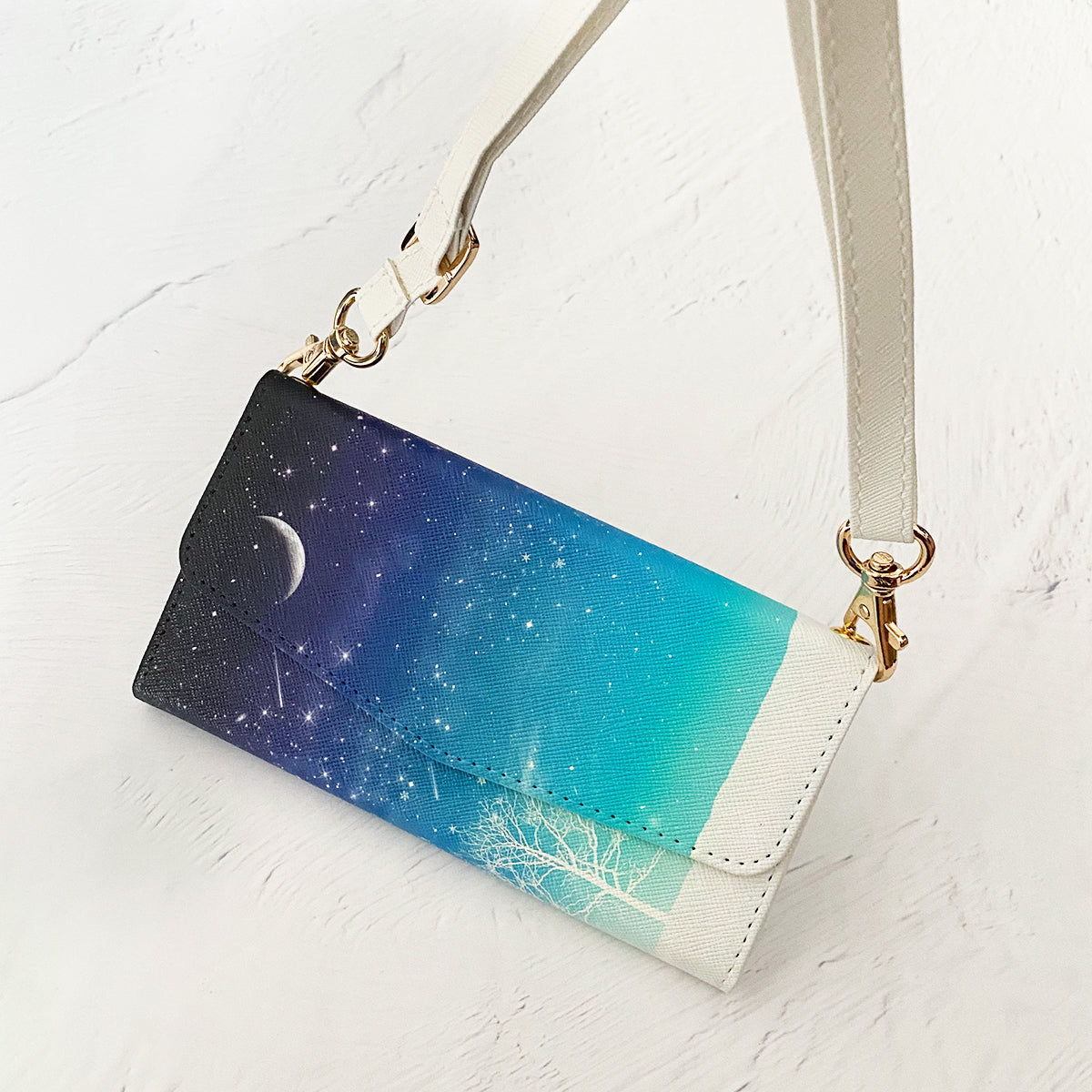 【三つ折り手帳型スマホケース/ショルダーストラップ付き】冬の星空(iPhone)