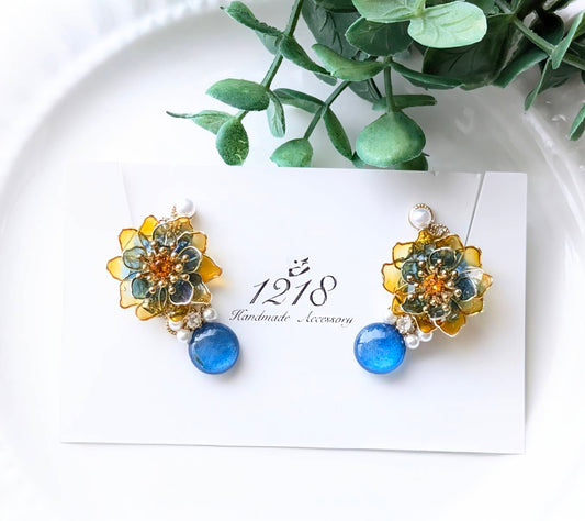 夕焼けから晴天夜へ色変わる花 イヤーカフ