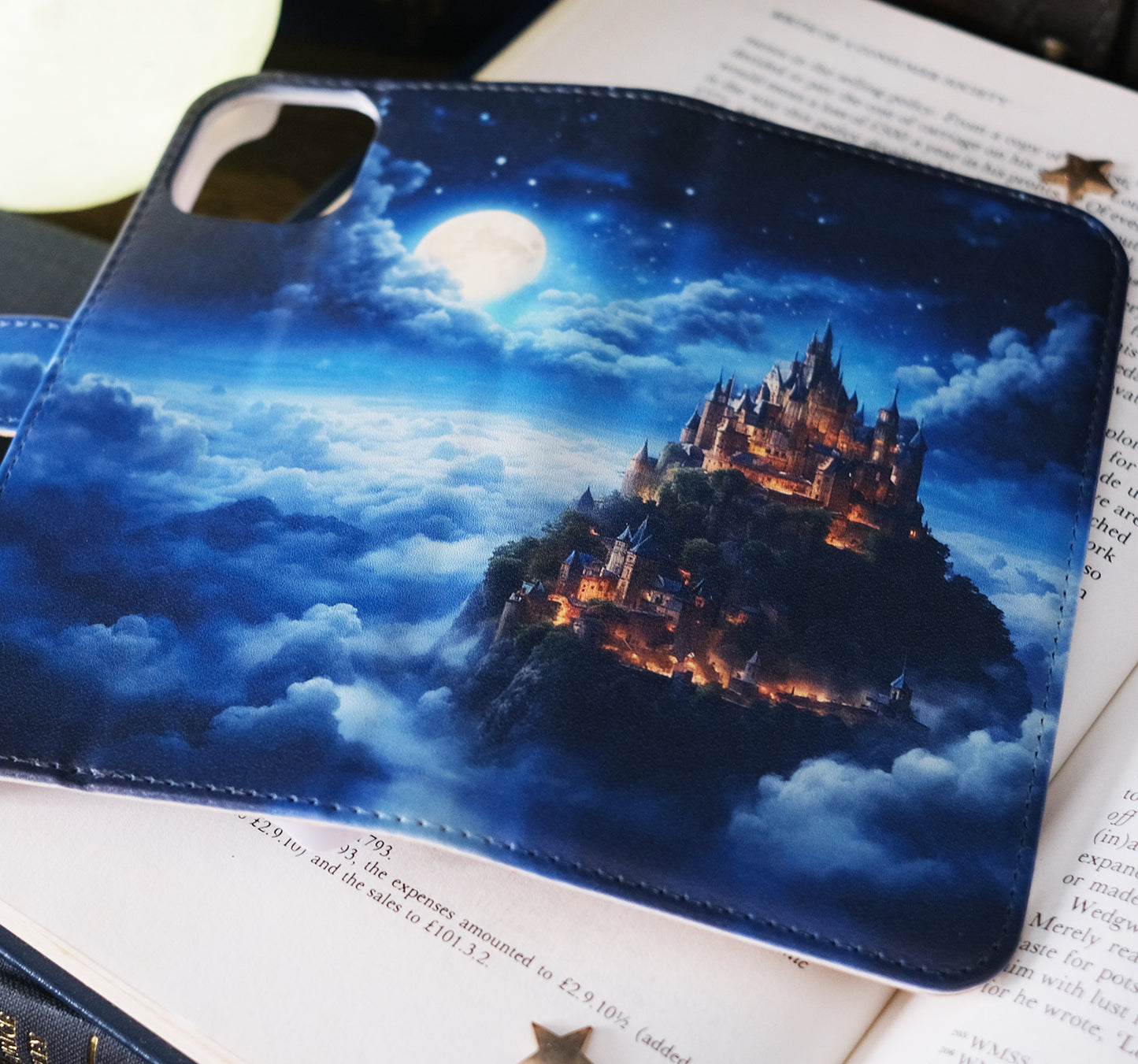 【手帳型iPhoneケース】満月と天空にそびえ立つ城