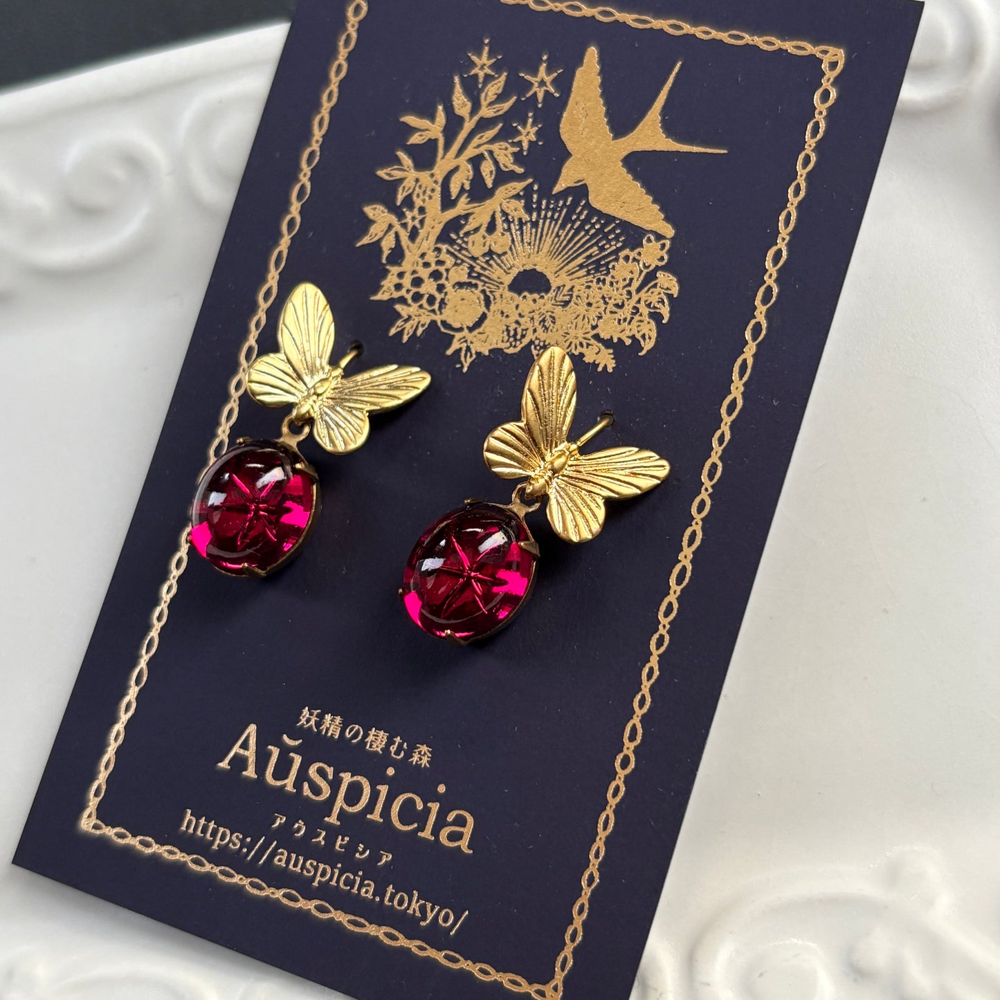 蝶と星の耳飾り（ピアス/イヤリング）